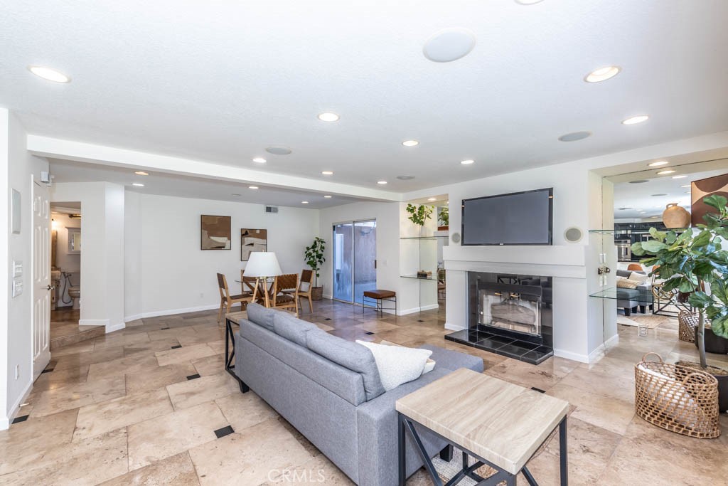 1881 Duncan Way Corona, CA 92881 - Photo 41 of 75 a living room with furniture and a fireplace