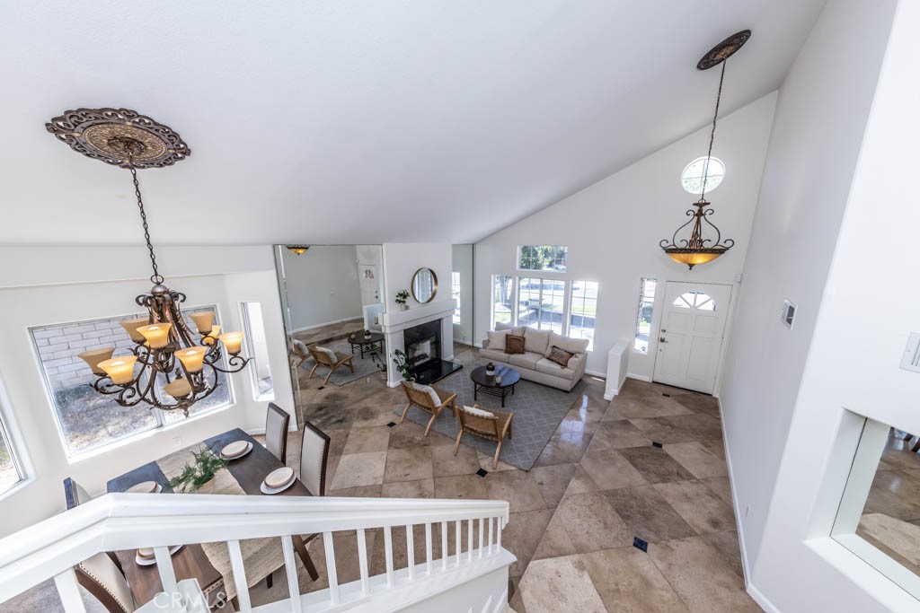 1881 Duncan Way Corona, CA 92881 - Photo 43 of 75 a living room with furniture and a chandelier