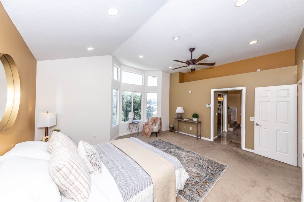 1881 Duncan Way Corona, CA 92881 - Photo 48 of 75 a bedroom with a bed and a large window