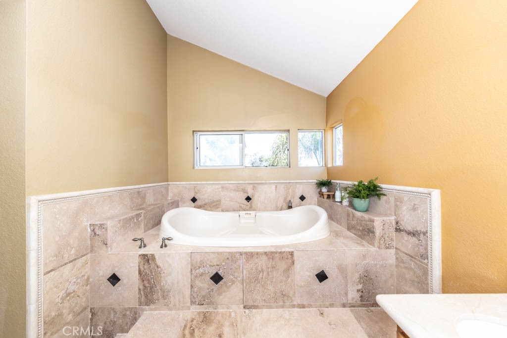 1881 Duncan Way Corona, CA 92881 - Photo 53 of 75 a bathroom with a sink and a bathtub