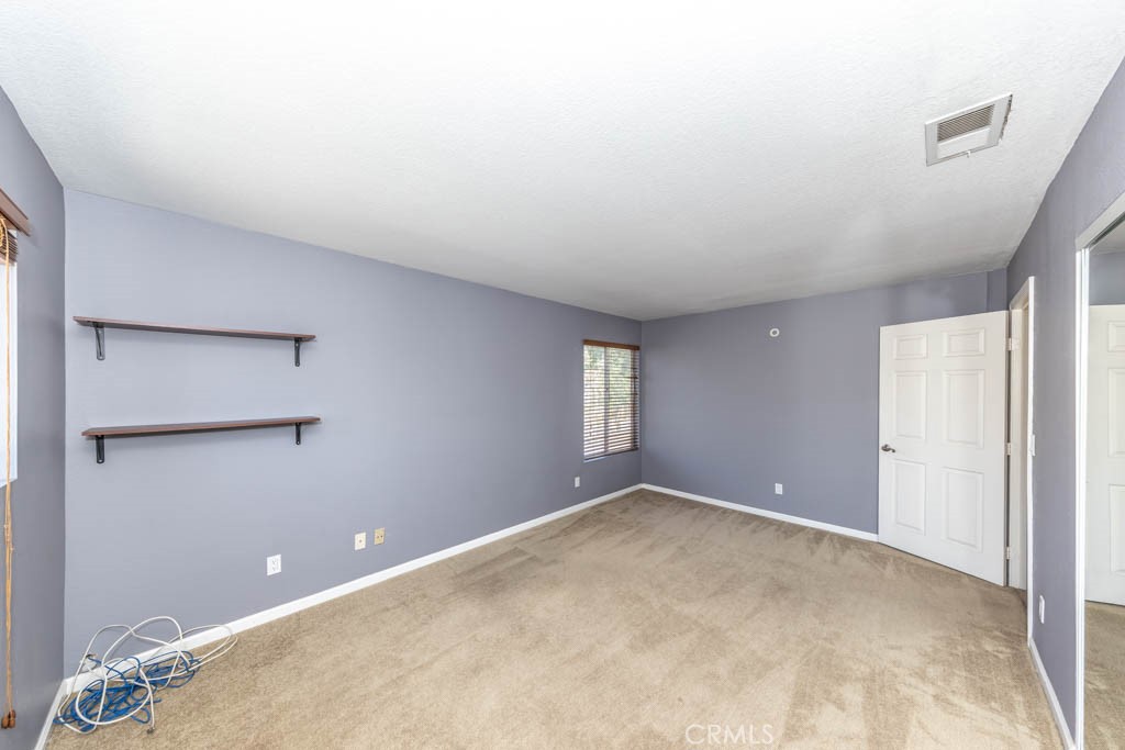 1881 Duncan Way Corona, CA 92881 - Photo 62 of 75 a view of an empty room with a window