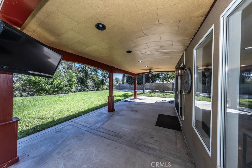 1881 Duncan Way Corona, CA 92881 - Photo 66 of 75 a view of a porch with backyard of the house