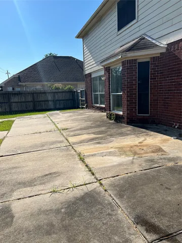 a view of a house with a patio