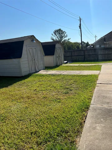 a view of a swimming pool with a backyard