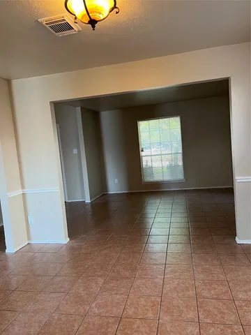 a view of empty room with a window