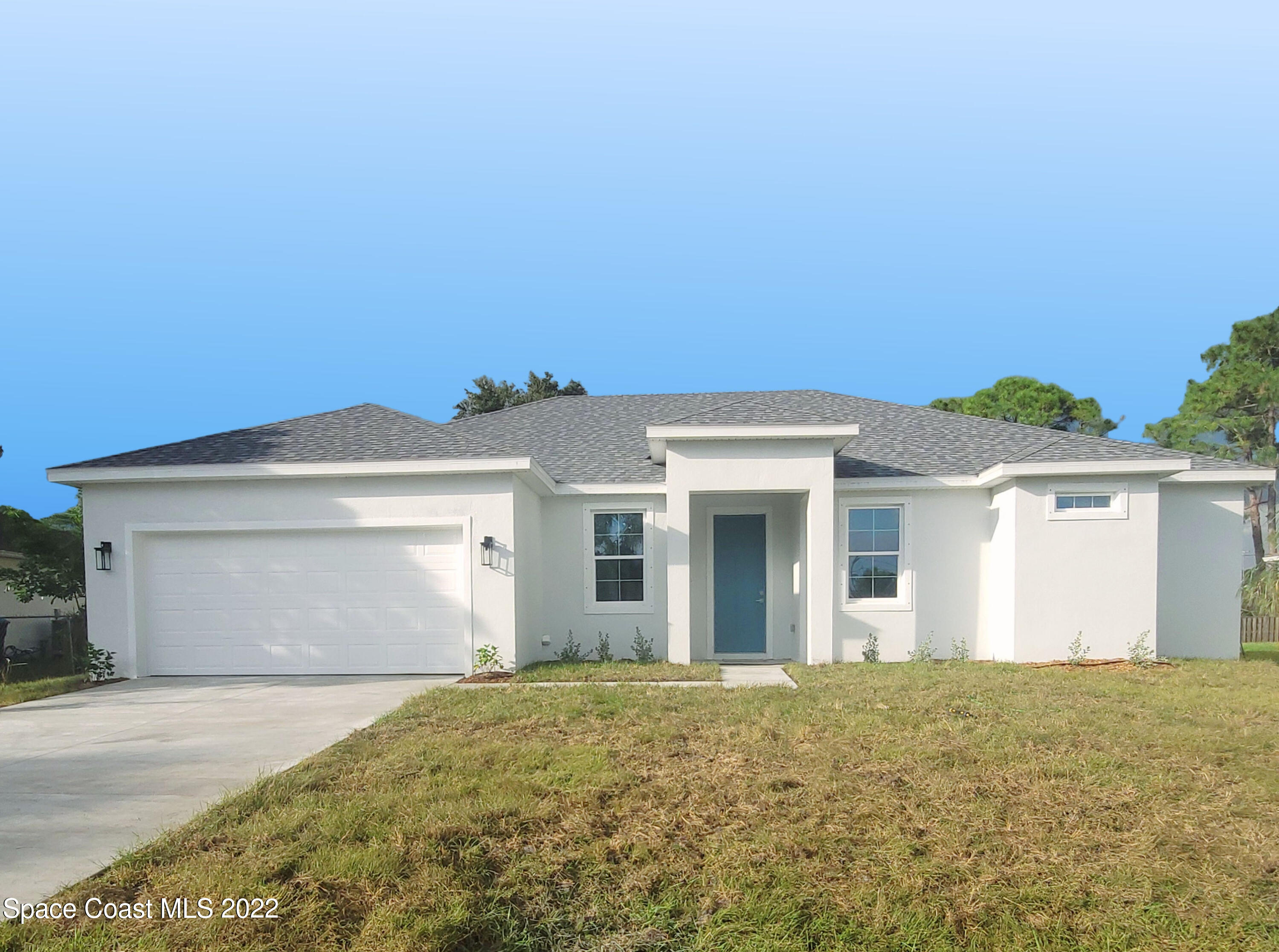 736 Doverbrook Road Northwest Palm Bay, FL 32907 - Photo 1 of 17 Front View