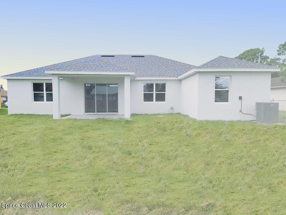 736 Doverbrook Road Northwest Palm Bay, FL 32907 - Photo 16 of 17 Rear View