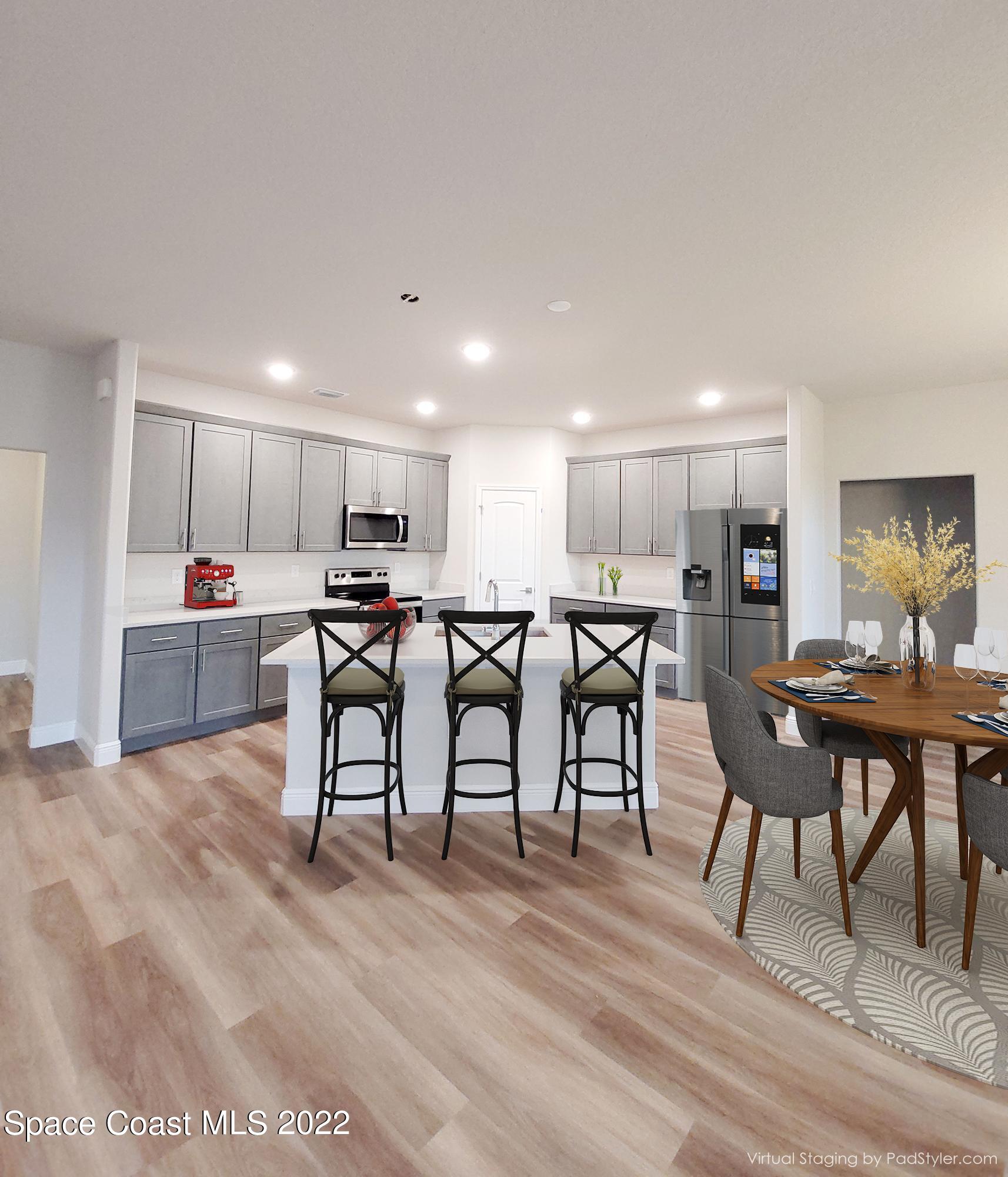 736 Doverbrook Road Northwest Palm Bay, FL 32907 - Photo 4 of 17 Virtually Staged Kitchen/Dining