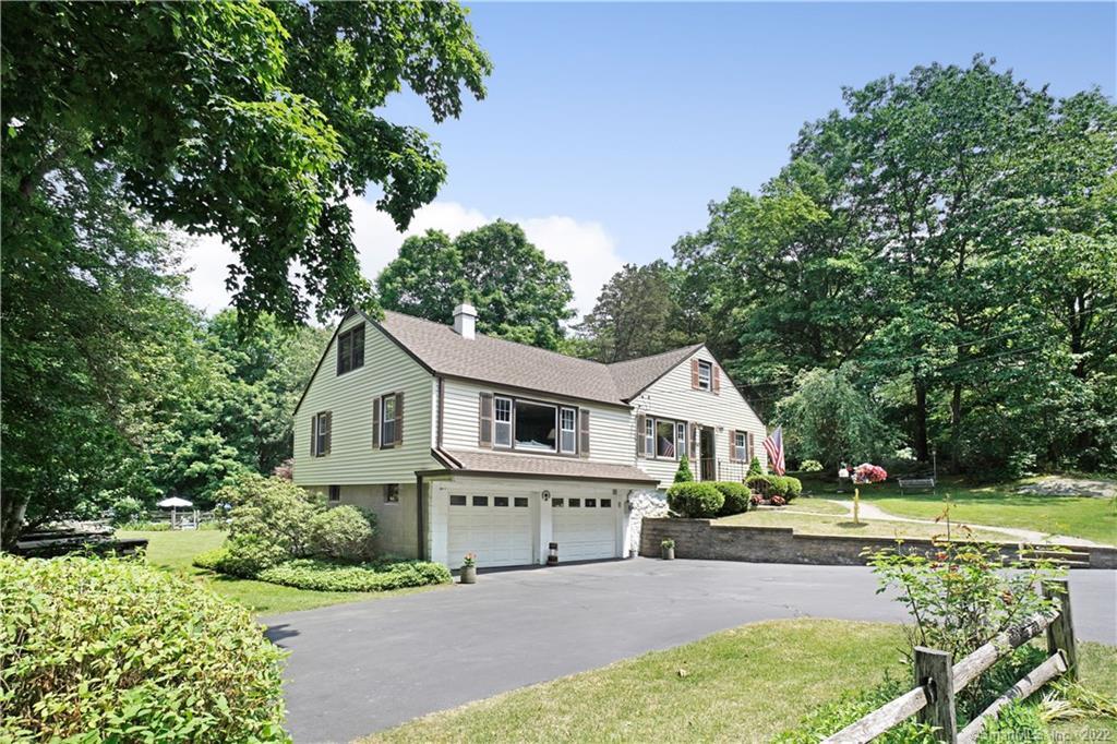 560 Cutler's Farm Road Monroe, CT 06468 - Photo 1 of 1 a front view of a house with garden