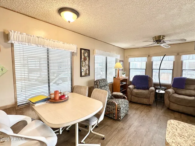 a kitchen with a sink cabinets and window