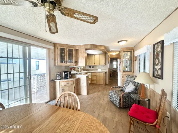 a kitchen with a stove a sink and a refrigerator