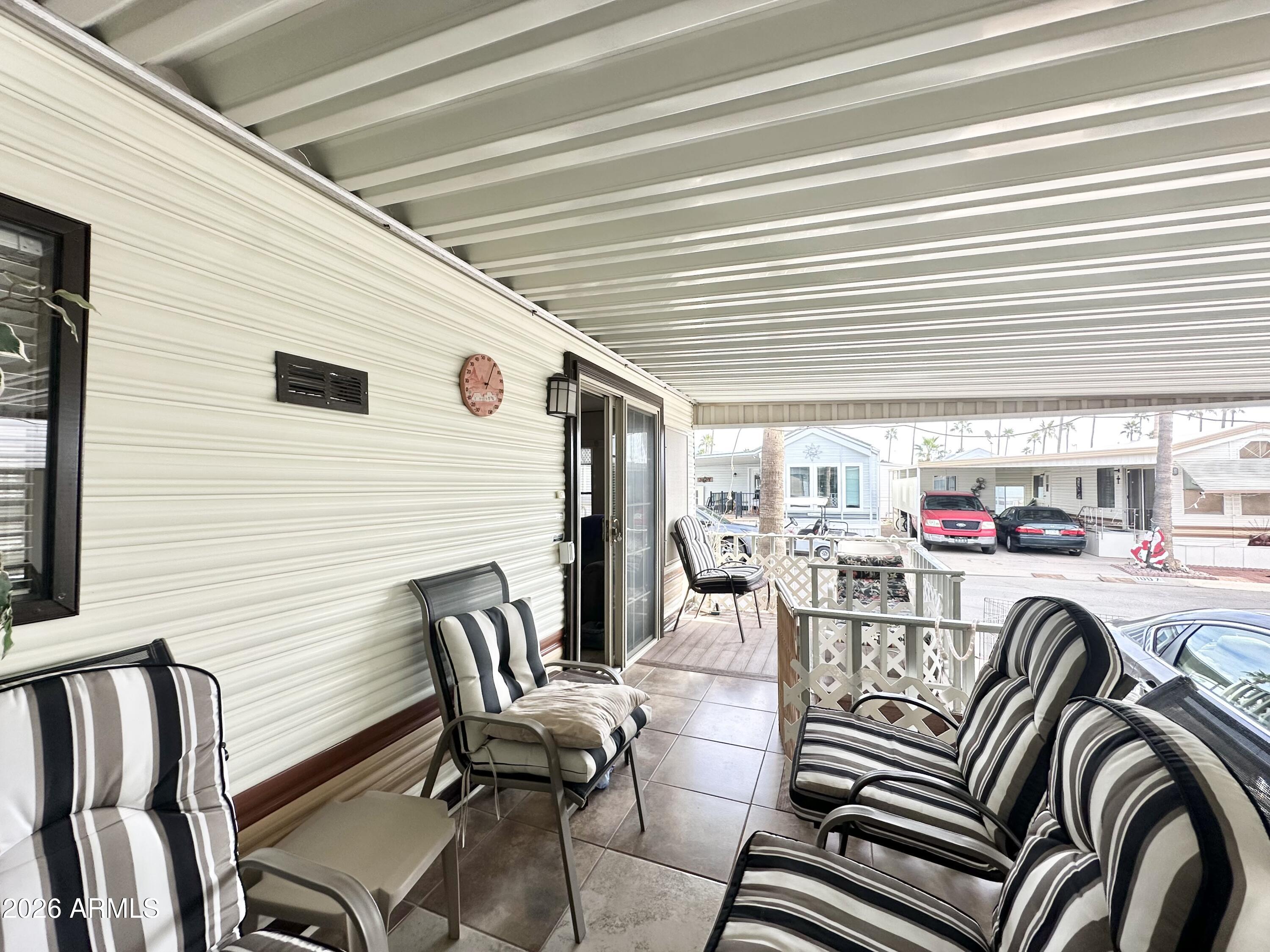 1015 South Prospectors Road Apache Junction, AZ 85119 - Photo 9 of 63 GRAND TILED DECK