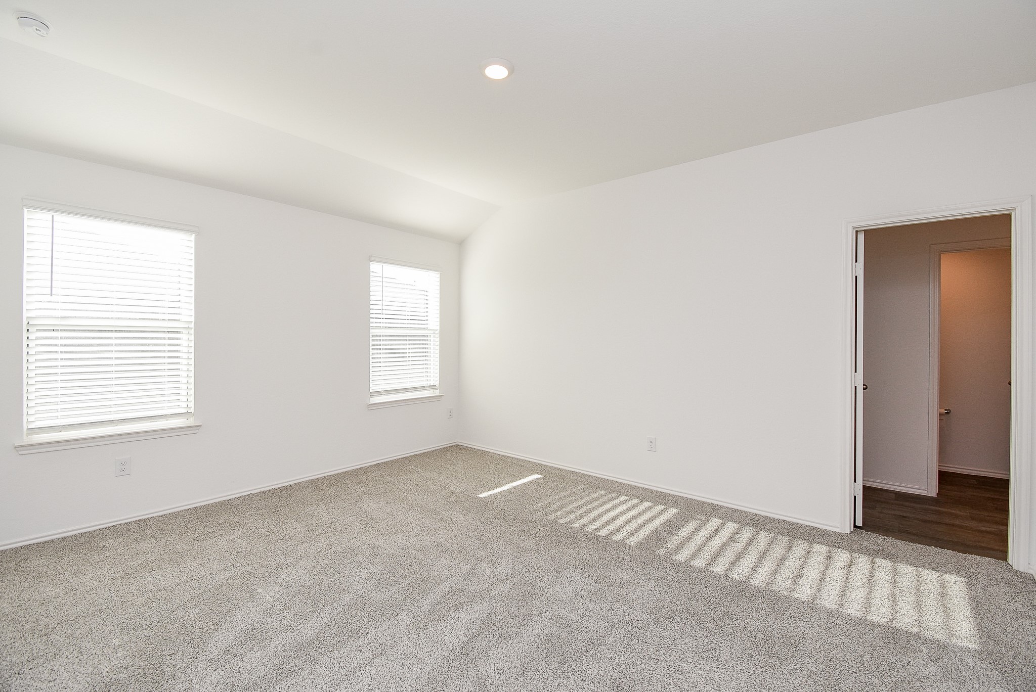 2827 Bur Lndg Lane Rosenberg, TX 77469 - Photo 14 of 20 an empty room with windows