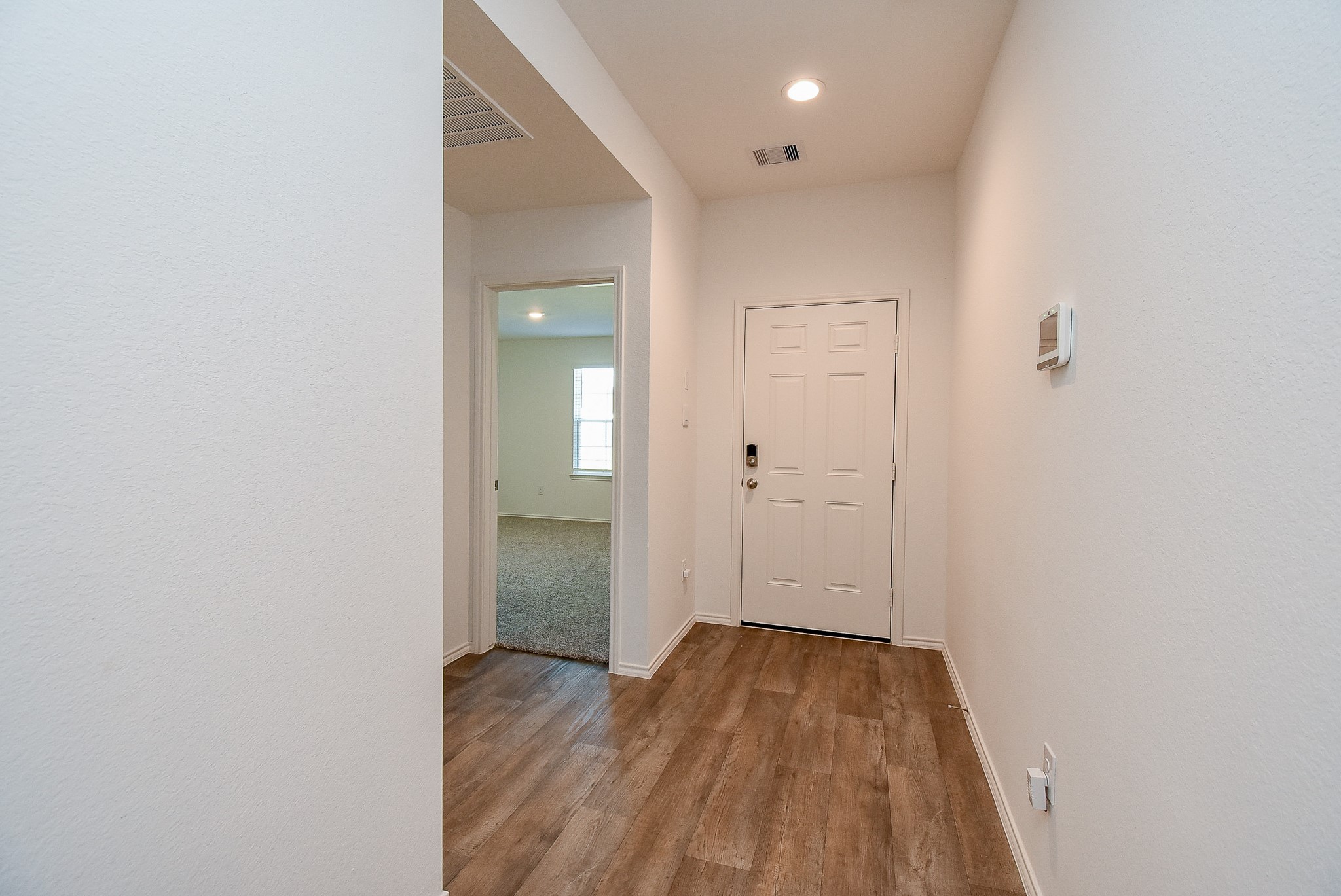 2827 Bur Lndg Lane Rosenberg, TX 77469 - Photo 2 of 20 a view of a room with wooden floor