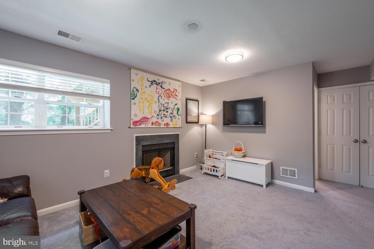 2801 Roesh Way Vienna, VA 22181 - Photo 25 of 32 Recreation Room with Wood-burning Fireplace