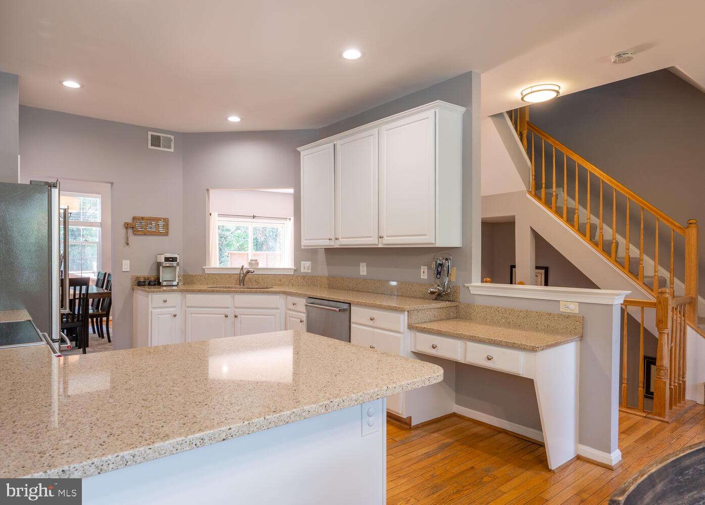 2801 Roesh Way Vienna, VA 22181 - Photo 10 of 32 Open Kitchen with Barstool Seating and Desk