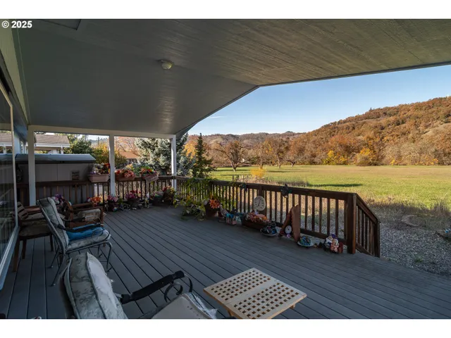 a view of a two chairs in the roof deck