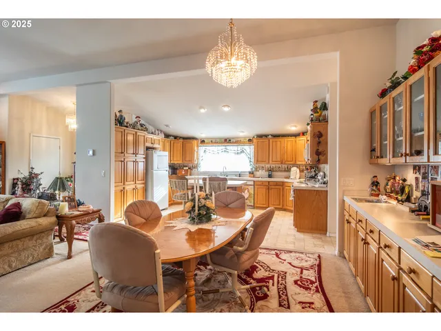 a kitchen with stainless steel appliances a sink counter space and a window