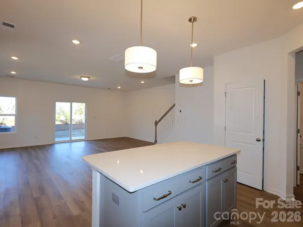 a kitchen with a counter space a sink and appliances