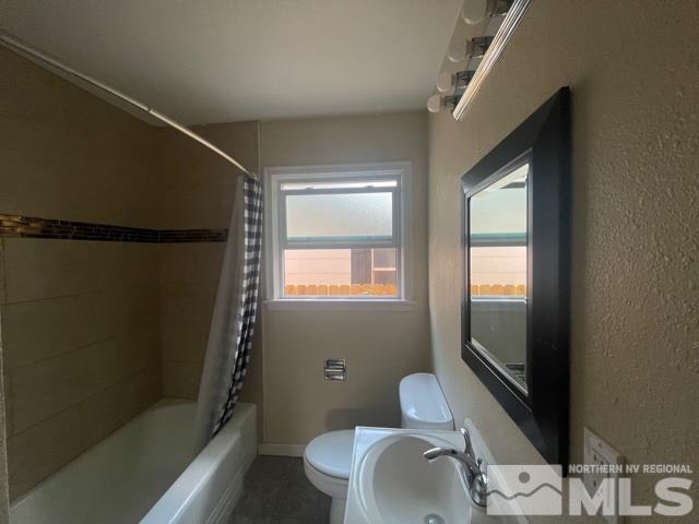 690 Cleveland Avenue Reno, NV 89503 - Photo 11 of 15 a bathroom with a sink toilet and shower