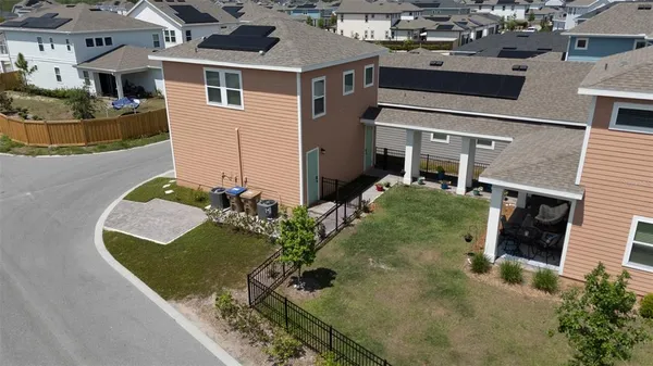 an aerial view of a house with garden