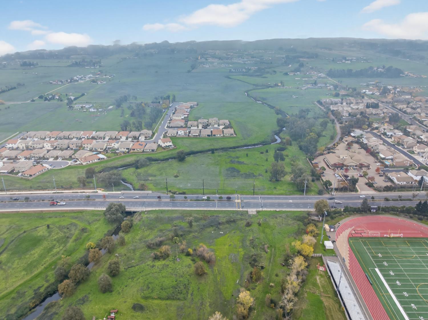 0 Calvine Road Elk Grove, CA 95624 - Photo 15 of 34 a view of a town with mountains in the background