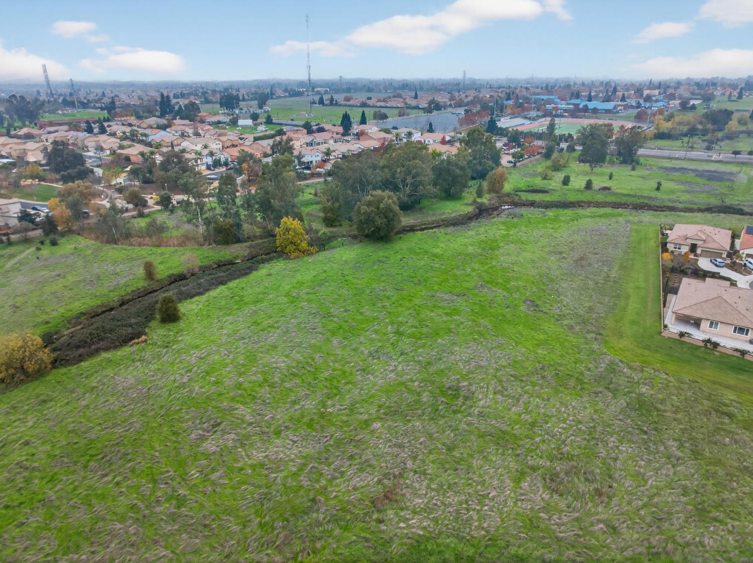 0 Calvine Road Elk Grove, CA 95624 - Photo 20 of 34 an aerial view of a houses with outdoor space and river