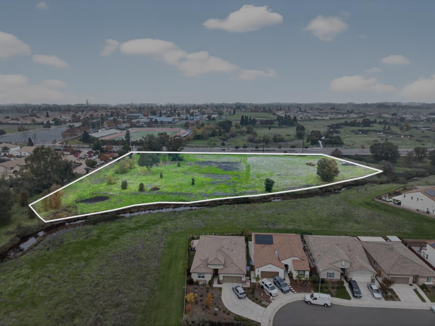 0 Calvine Road Elk Grove, CA 95624 - Photo 4 of 34 an aerial view of a house with a yard