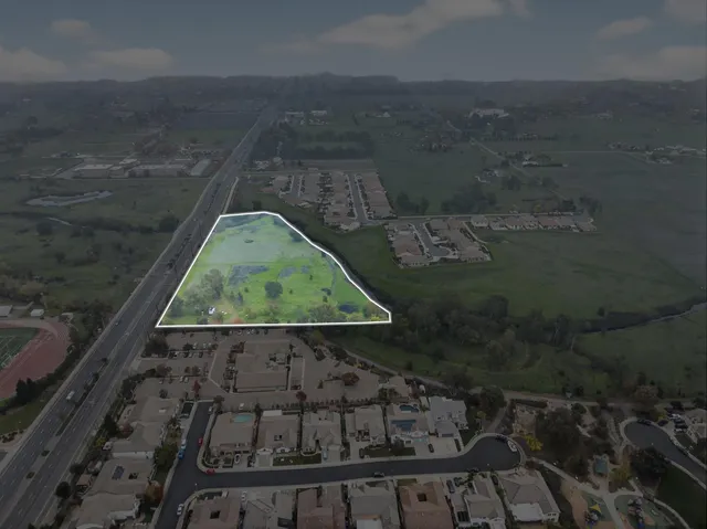 an aerial view of a highlighted house