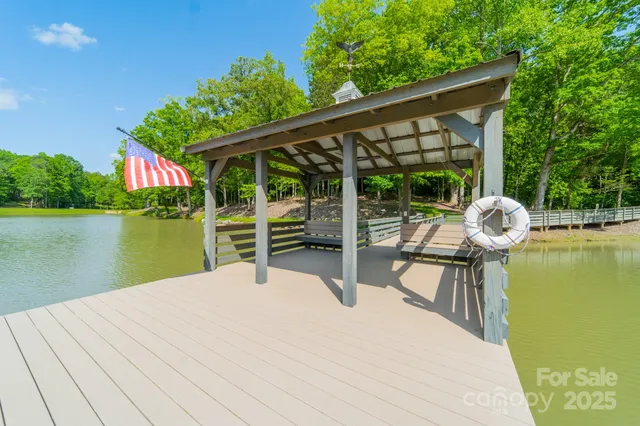 a house view with a lake view