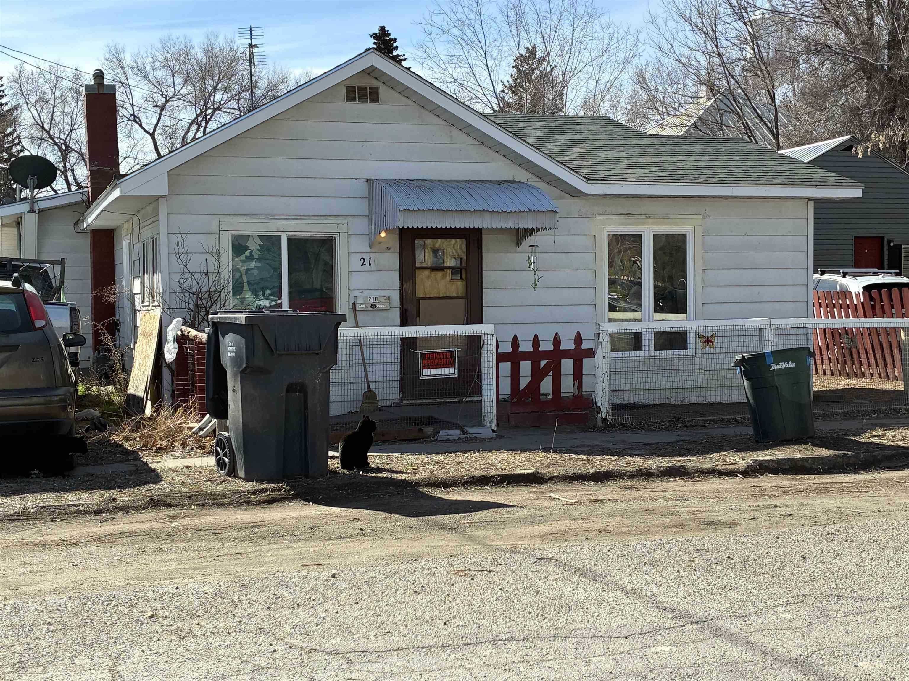 210 East 2nd Street Shoshone, ID 83352 - Photo 1 of 1 View of front of home with roof with shingles