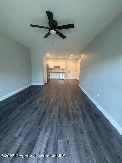 428 Circle Drive Taylor, PA 18517 - Photo 11 of 33 a view of a big room with wooden floor wooden floor and windows