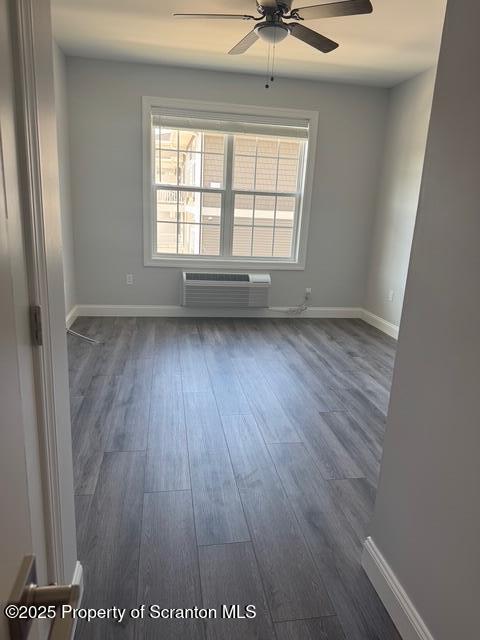 428 Circle Drive Taylor, PA 18517 - Photo 26 of 33 an empty room with wooden floor and windows