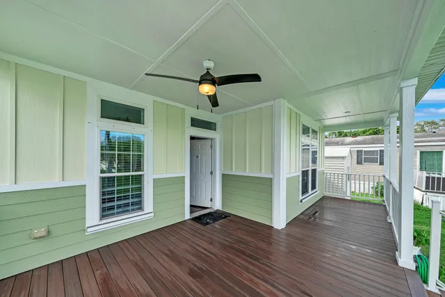 a view of outdoor space and wooden deck