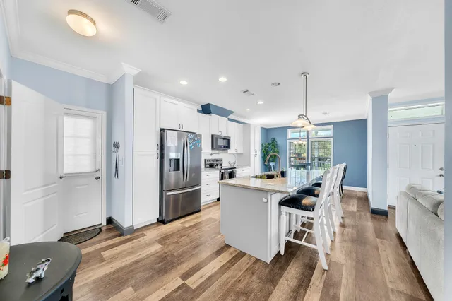 an aerial view of a swimming pool and outdoor space