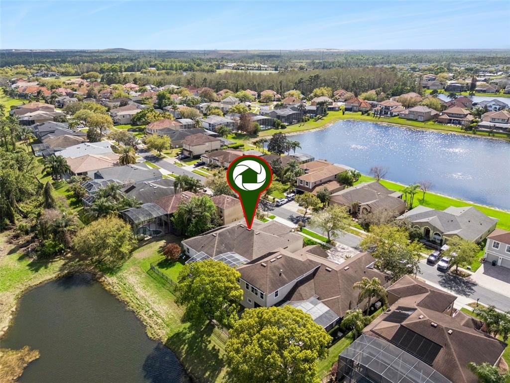 2541 Teton Stone Run Orlando, FL 32828 - Photo 62 of 82 an aerial view of residential houses with outdoor space