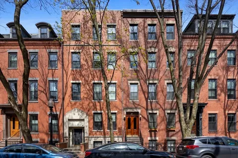 a view of a street with building