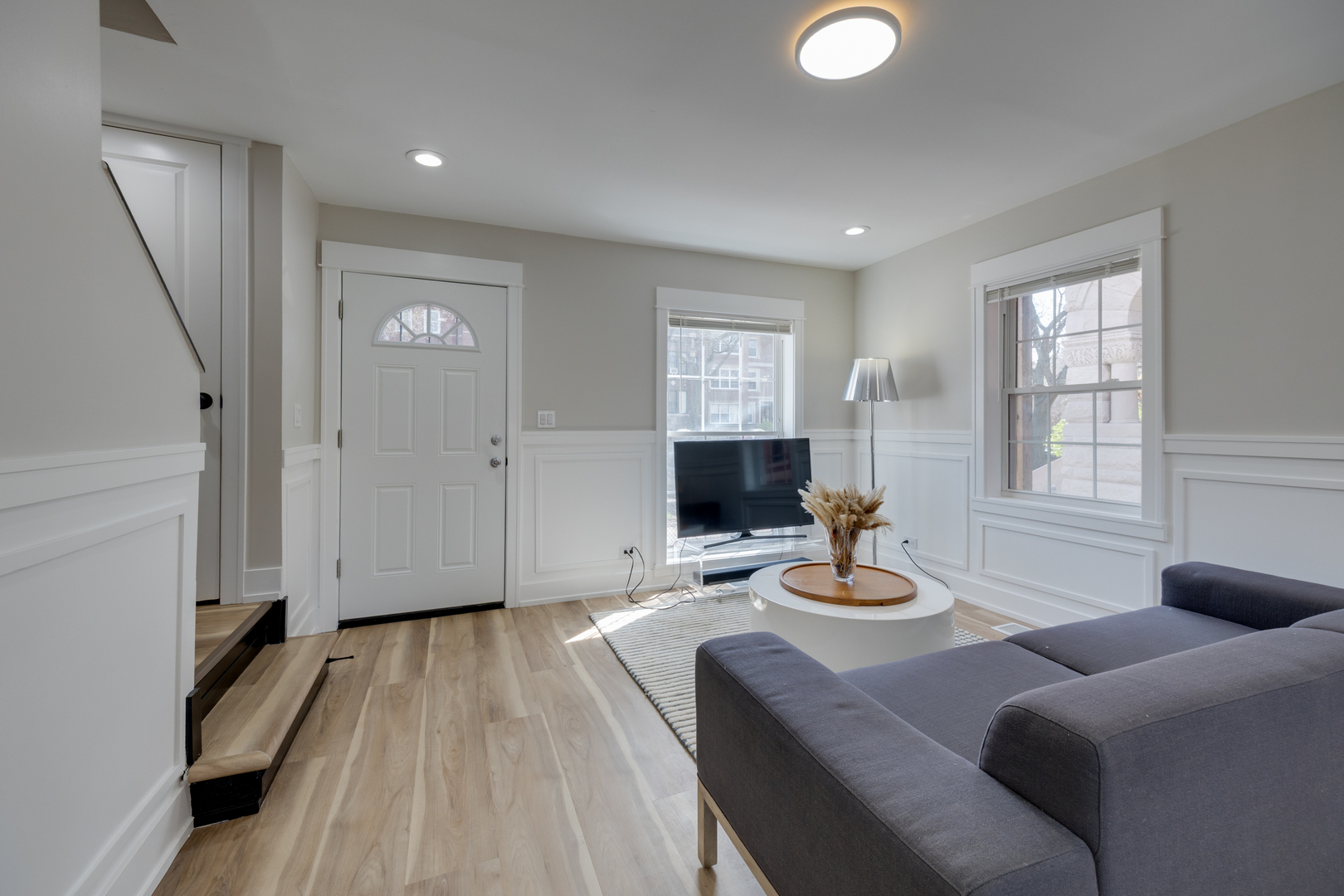 4134 South Michigan Avenue Chicago, IL 60653 - Photo 6 of 20 a living room with furniture and a fireplace