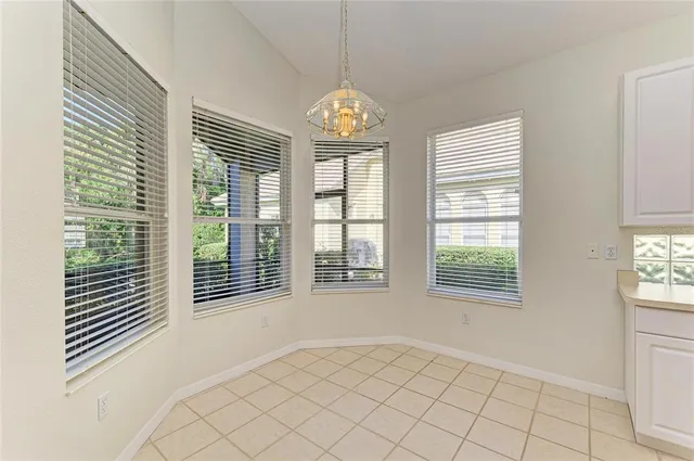 a spacious bathroom with a double vanity sink mirror and double