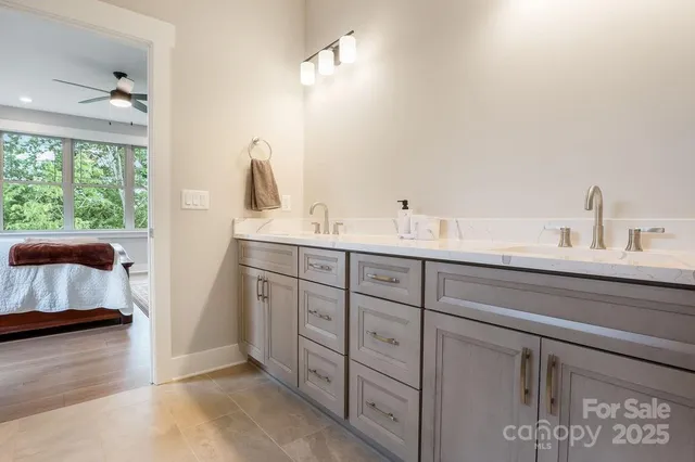 a room with a desk and mirror