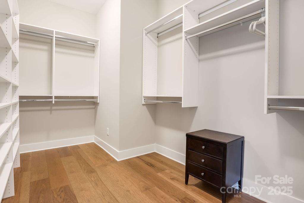 21 Craftsman Overlook Ridge Arden, NC 28704 - Photo 24 of 36 a room with a desk and mirror