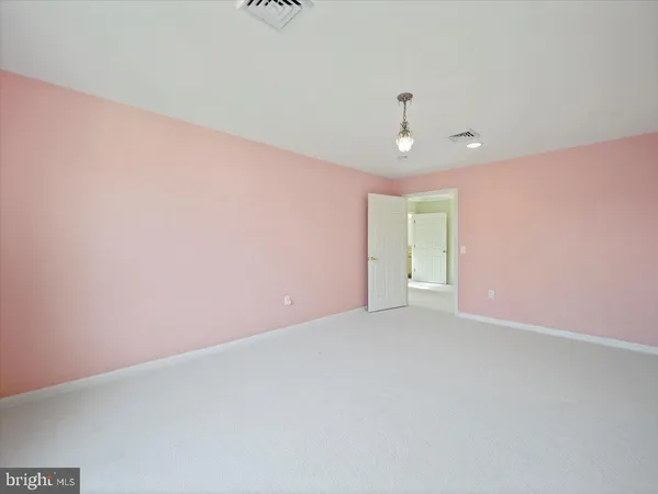 a view of a room with a large window