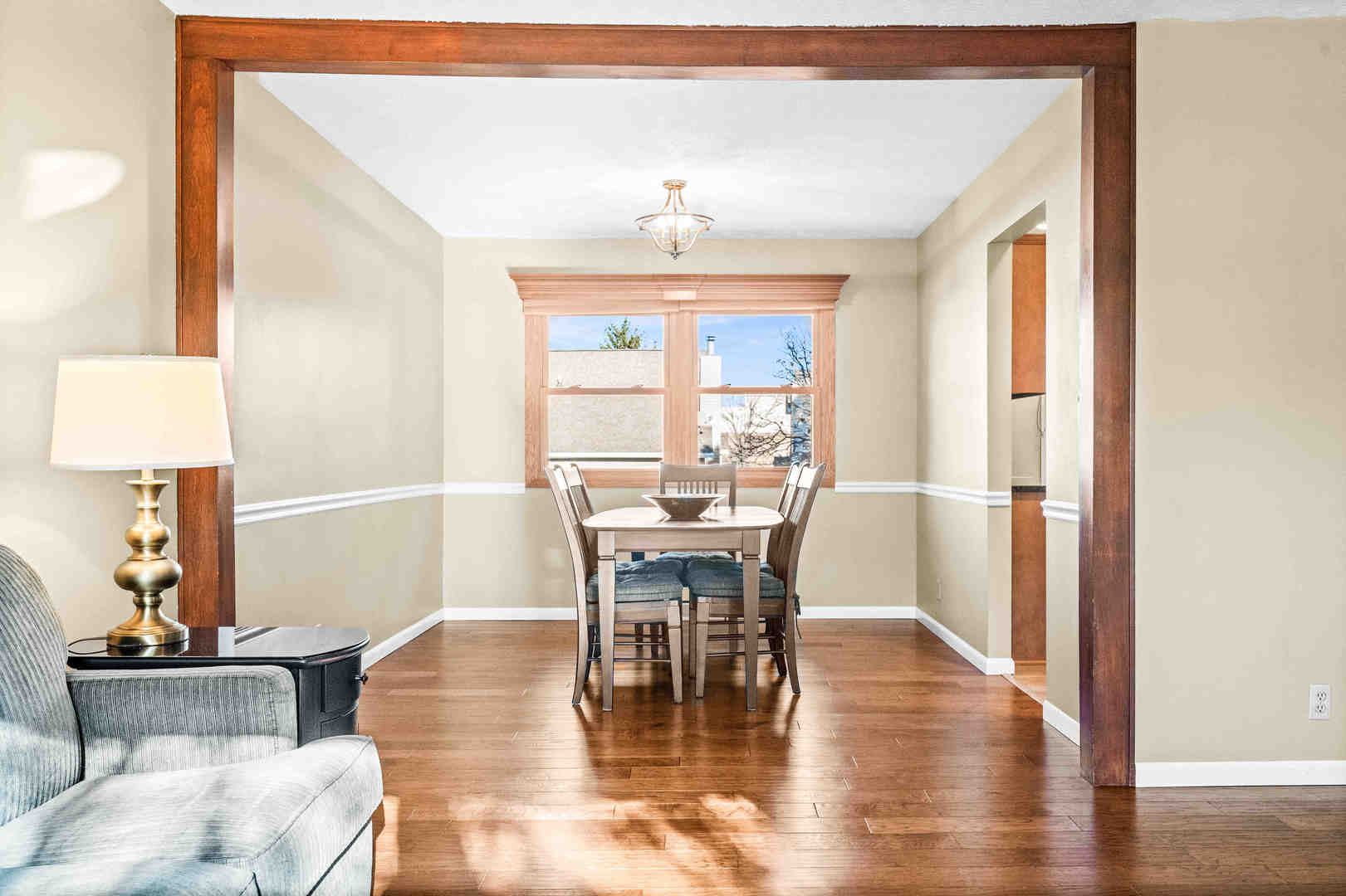 308 Raleigh Court Normal, IL 61761 - Photo 11 of 40 a view of a dining room with furniture window and wooden floor
