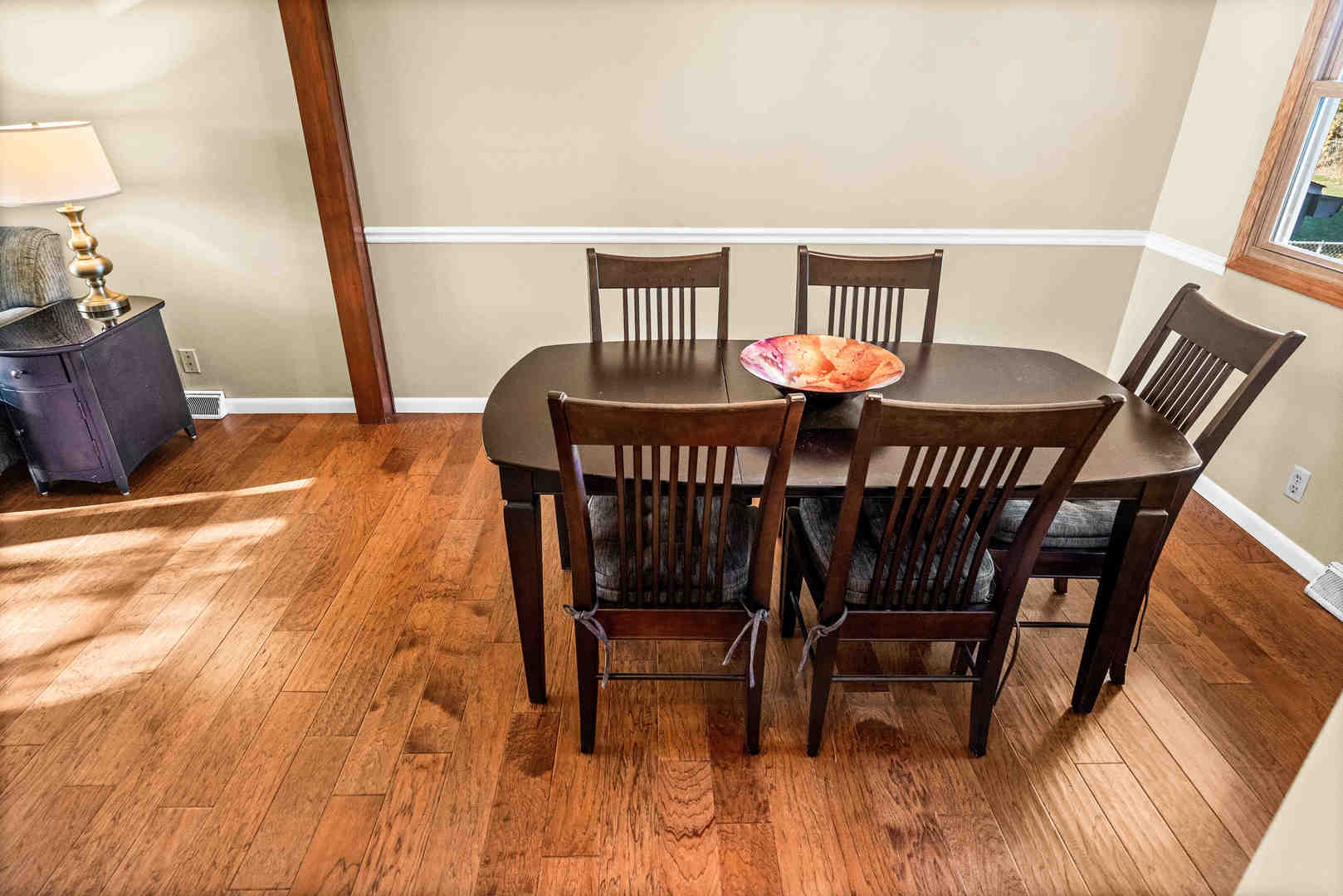 308 Raleigh Court Normal, IL 61761 - Photo 12 of 40 a view of a dining room with furniture and wooden floor