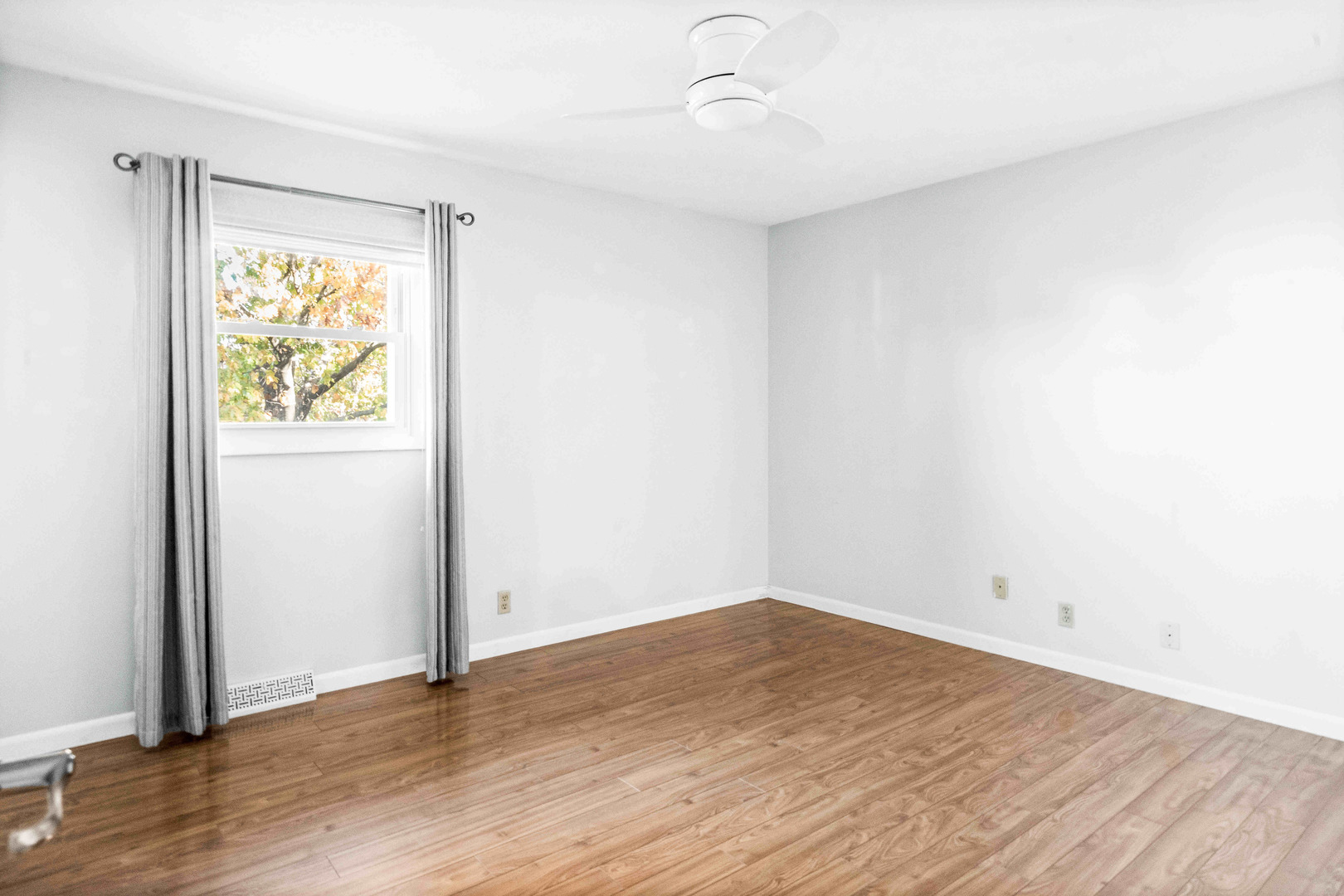 308 Raleigh Court Normal, IL 61761 - Photo 22 of 40 an empty room with wooden floor and windows