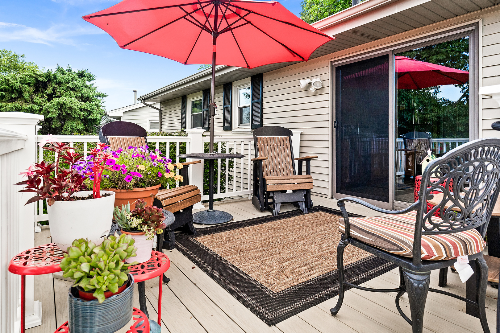 308 Raleigh Court Normal, IL 61761 - Photo 34 of 40 a group of people sitting in front of a cafe