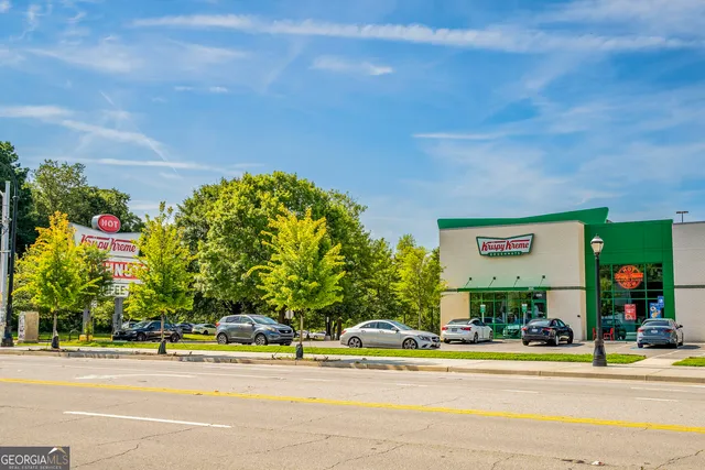 a view of a building with a street