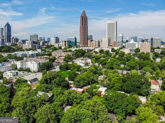 a view of a city with tall buildings