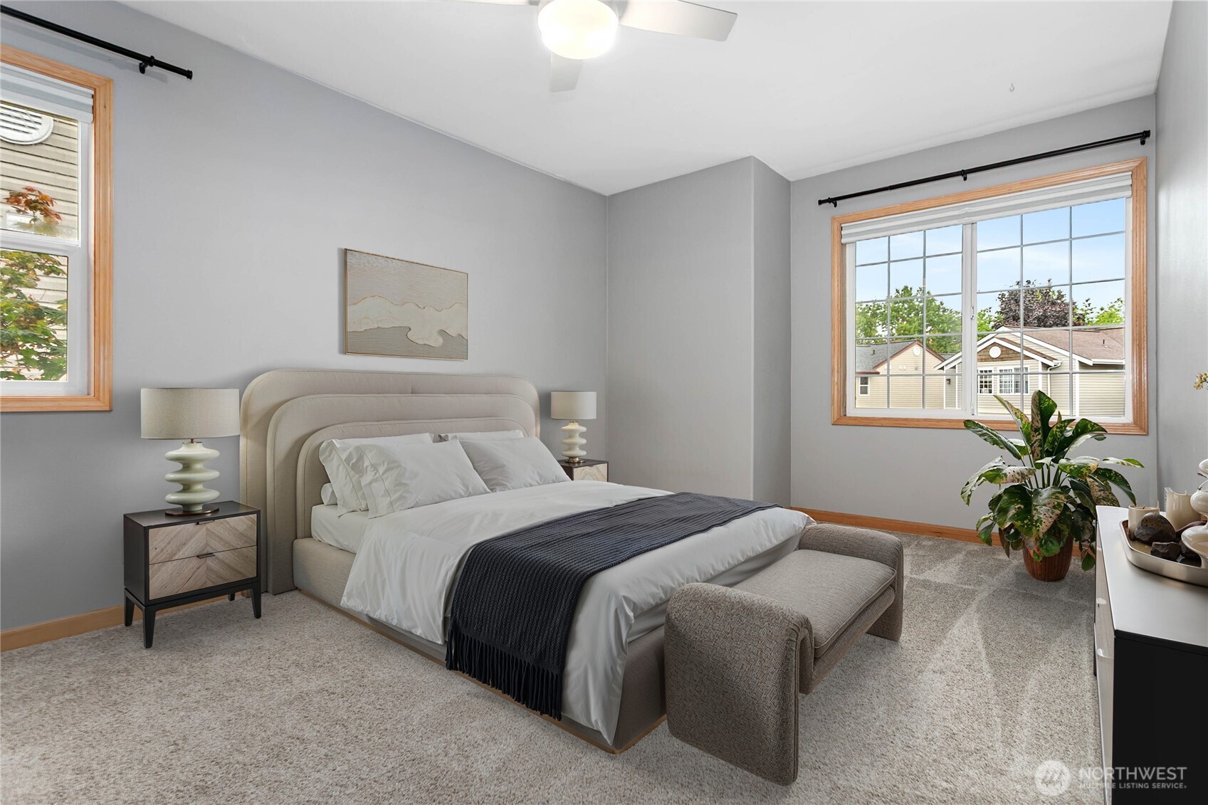 641 West Horton Way, Unit 230 Bellingham, WA 98226 - Photo 11 of 24 a bedroom with a bed and a potted plant