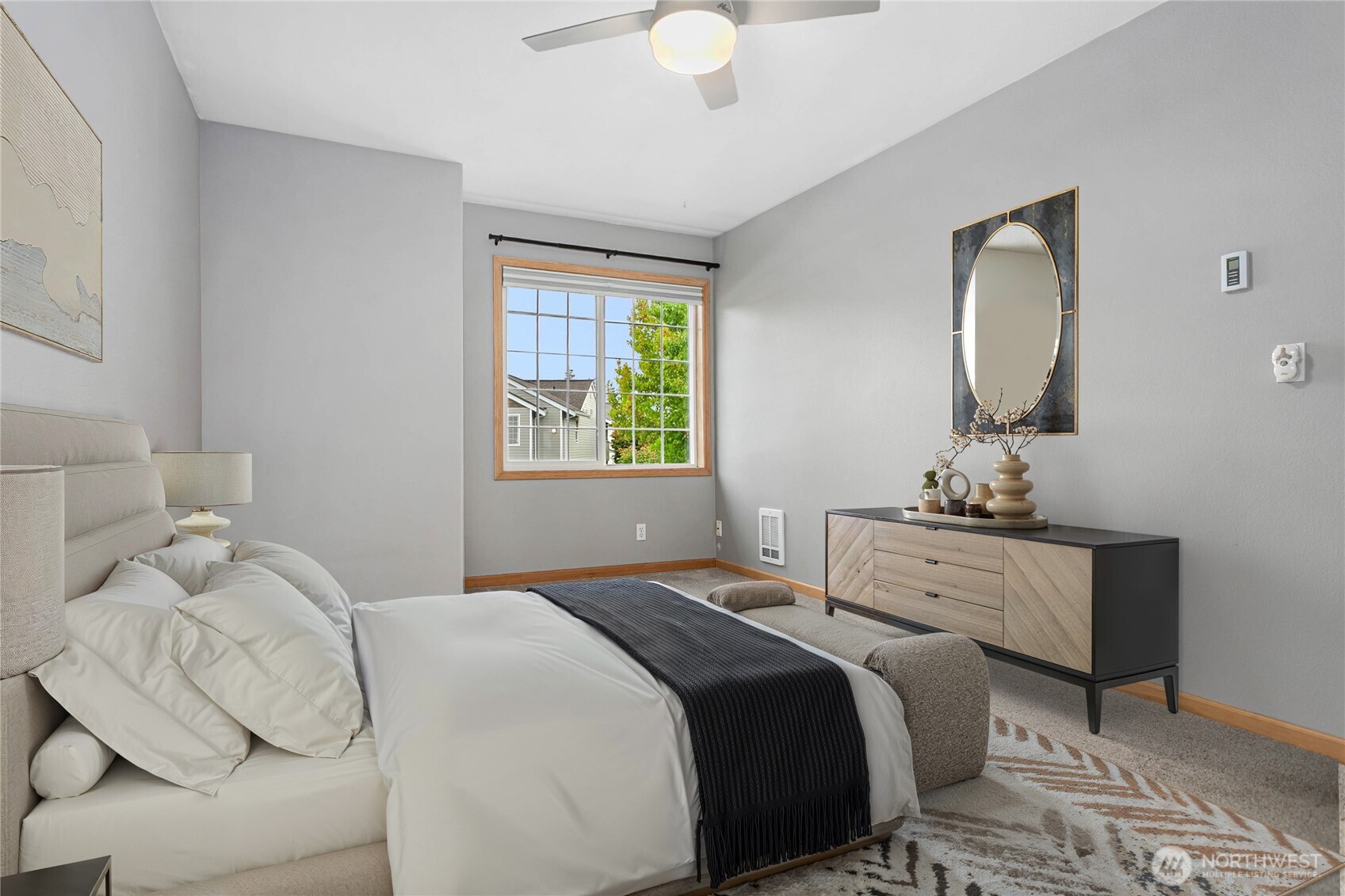 641 West Horton Way, Unit 230 Bellingham, WA 98226 - Photo 14 of 24 a bedroom with a bed and a chandelier